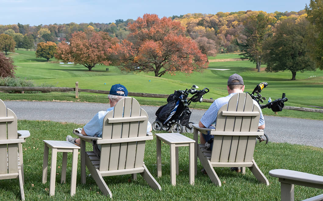 golfers relaxing in lawn chairs